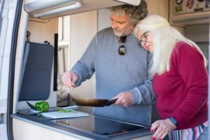 A couple preparing a healthy meal together in their kitchen.