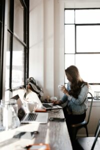 Woman starting her morning at a desk with intention and calm